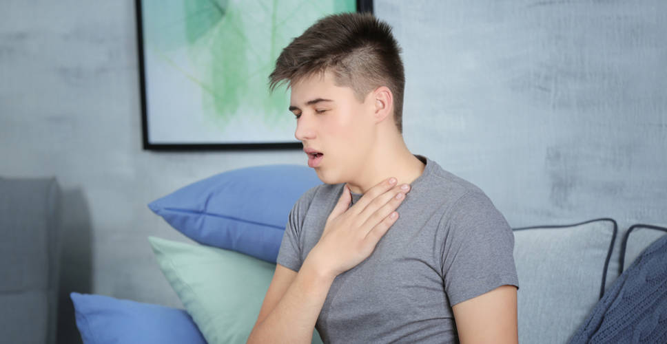 coughing teen